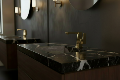 Background faucet matched to the brushed-gold finish