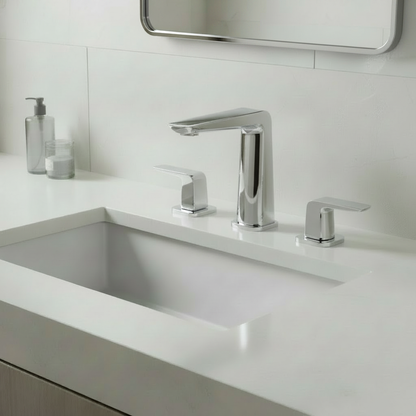 Bathroom with matching chrome faucet and mirror frame