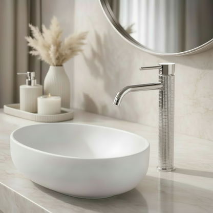 Lifestyle image with chrome faucet, mirror frame, and soap dispenser pump