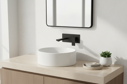 Modern bathroom lifestyle scene with the black wall-mounted faucet